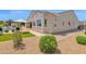 Exterior view of the home featuring a pool, a pergola, and manicured landscaping at 20151 E Via Del Palo St, Queen Creek, AZ 85142
