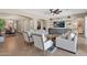 Comfortable open-concept living space featuring a built-in entertainment center and neutral decor at 20151 E Via Del Palo St, Queen Creek, AZ 85142