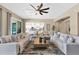 Bright living area featuring views to the kitchen and outdoor patio at 20151 E Via Del Palo St, Queen Creek, AZ 85142