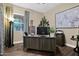 Comfortable home office features a wooden desk and stylish decor, perfect for remote work at 20151 E Via Del Palo St, Queen Creek, AZ 85142