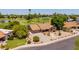 Aerial view of a single story home with desert landscaping and golf course views at 2448 S Standage --, Mesa, AZ 85202