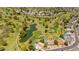 Stunning aerial view of the golf course community with lush greenery and winding paths at 2448 S Standage --, Mesa, AZ 85202