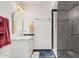 Bathroom featuring marble countertops, modern fixtures, and a glass-door walk-in shower at 2448 S Standage --, Mesa, AZ 85202
