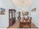 A formal dining room featuring an elegant chandelier and detailed woodwork at 2448 S Standage --, Mesa, AZ 85202