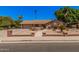 Attractive single-level home boasting desert landscaping, a two-car garage, and a welcoming entrance at 2448 S Standage --, Mesa, AZ 85202