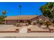 Attractive single-Gathering home featuring a well-maintained front yard with desert landscaping at 2448 S Standage --, Mesa, AZ 85202