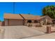 Picture of the front of the house, featuring a brick driveway and desert landscaping at 2448 S Standage --, Mesa, AZ 85202