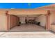 Spacious garage featuring epoxy flooring, storage cabinets, a work bench, and ample space for storage at 2448 S Standage --, Mesa, AZ 85202