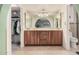 The main bathroom features a dual sink vanity and walk-in closet at 2448 S Standage --, Mesa, AZ 85202