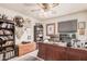 Well appointed home office with custom wooden desk and bookcases at 2448 S Standage --, Mesa, AZ 85202