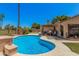 Backyard pool with patio area and outdoor grill, perfect for entertaining guests at 2448 S Standage --, Mesa, AZ 85202