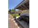 Inviting backyard showcasing a spa, gazebo, covered area, and synthetic grass ideal for outdoor entertainment at 2715 E Canyon Creek Dr, Gilbert, AZ 85295