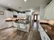 Modern kitchen features white cabinets, stainless steel appliances, and granite countertops at 2715 E Canyon Creek Dr, Gilbert, AZ 85295