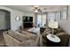 Comfortable living room with sliding glass doors and neutral decor offers an inviting space at 2715 E Canyon Creek Dr, Gilbert, AZ 85295