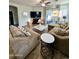 Comfortable living room with modern furnishings and a sliding glass door to the outdoor patio at 2715 E Canyon Creek Dr, Gilbert, AZ 85295