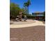 Community playground featuring slides, shade structures, and walking paths amidst beautifully landscaped surroundings at 2715 E Canyon Creek Dr, Gilbert, AZ 85295