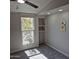 Bedroom with natural light, neutral paint, ceiling fan, closet and carpet at 2946 N 14Th N St # 14, Phoenix, AZ 85014