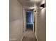 Hallway features neutral paint, carpet, and modern lighting at 2946 N 14Th N St # 14, Phoenix, AZ 85014