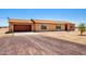 Single-story home with neutral exterior, garage, and desert landscaping at 31515 W Buchanan St, Buckeye, AZ 85326