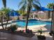 Stunning backyard pool with landscaped surroundings and a serene atmosphere at 316 W Anderson Ave, Phoenix, AZ 85023