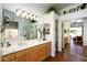 A bright bathroom features double sinks, a large mirror, and stylish decor at 316 W Anderson Ave, Phoenix, AZ 85023