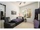 Cozy bedroom with a comfortable bed, bright window, and decorative accents at 316 W Anderson Ave, Phoenix, AZ 85023