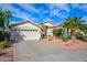 Charming home featuring manicured landscaping, a two-car garage, and a well-maintained lawn at 316 W Anderson Ave, Phoenix, AZ 85023