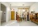 Bright living room featuring large windows, plantation shutters, and elegant decor at 316 W Anderson Ave, Phoenix, AZ 85023