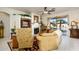 This living room features a fireplace, built-in shelving, and backyard views at 316 W Anderson Ave, Phoenix, AZ 85023