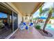 Covered patio with wicker furniture, a ceiling fan, and views of the pool at 316 W Anderson Ave, Phoenix, AZ 85023