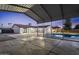 Wide view of the backyard with a pool, large shed, and covered patio area at 3506 W Yucca St, Phoenix, AZ 85029
