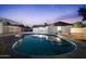 Inviting backyard with a refreshing pool, covered patio, and ample space for outdoor enjoyment at 3506 W Yucca St, Phoenix, AZ 85029