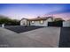 Charming home showcasing modern curb appeal and a spacious driveway and rock landscaping at 3506 W Yucca St, Phoenix, AZ 85029