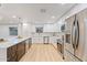 Beautiful kitchen boasting stainless steel appliances, bright lighting, and stylish countertops at 3506 W Yucca St, Phoenix, AZ 85029