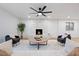 Cozy living room with a modern fireplace, comfortable seating, and stylish decor at 3506 W Yucca St, Phoenix, AZ 85029