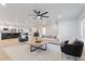Spacious living room with open floor plan, modern furnishings, and recessed lighting at 3506 W Yucca St, Phoenix, AZ 85029
