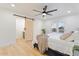 Relaxing bedroom with French doors and backyard view, wood floors, and natural light at 3506 W Yucca St, Phoenix, AZ 85029