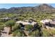 Stunning aerial view of estate featuring a private pool and mature landscaping in Scottsdale at 41576 N 107Th Way, Scottsdale, AZ 85262