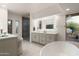 Modern bathroom features a standalone soaking tub, glass enclosed shower, and dual sink vanity at 41576 N 107Th Way, Scottsdale, AZ 85262