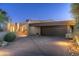 Contemporary home featuring a desert landscape, two-car garage and neutral color palette at 41576 N 107Th Way, Scottsdale, AZ 85262