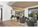 Bright living room with vaulted ceilings, wood floors, view windows, and neutral decor at 41576 N 107Th Way, Scottsdale, AZ 85262