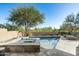 Beautiful pool and spa area surrounded by desert landscaping and privacy walls for a serene outdoor retreat at 41576 N 107Th Way, Scottsdale, AZ 85262