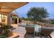 Inviting backyard oasis featuring a sparkling pool, spa, desert landscaping, and relaxing lounge chairs, perfect for outdoor enjoyment at 41576 N 107Th Way, Scottsdale, AZ 85262