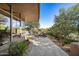 Stunning backyard featuring a pool, spa, lounge area and lush desert landscaping at 41576 N 107Th Way, Scottsdale, AZ 85262