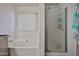 This bright bathroom features a soaking tub, frosted glass shower, and a miniature refrigerator at 4318 W Apollo Rd, Laveen, AZ 85339