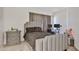 Comfortable bedroom with a large bed, soft lighting, and modern decor at 4318 W Apollo Rd, Laveen, AZ 85339