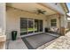 Enjoy outdoor living on this cozy covered patio with access to a lush backyard at 455 W Evergreen Pear Ave, Queen Creek, AZ 85140