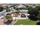 This aerial view highlights a well-equipped neighborhood playground, offering a fun and safe recreational area for families and children at 455 W Evergreen Pear Ave, Queen Creek, AZ 85140
