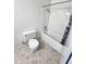 Bright bathroom featuring a pristine toilet and a combined shower and tub at 5016 W Sunrise Dr, Laveen, AZ 85339