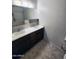 Bathroom showcasing double sinks, ample counter space, and storage at 5016 W Sunrise Dr, Laveen, AZ 85339